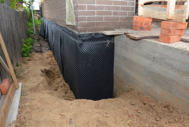 Happy homeowners after waterproofing job in Altamont